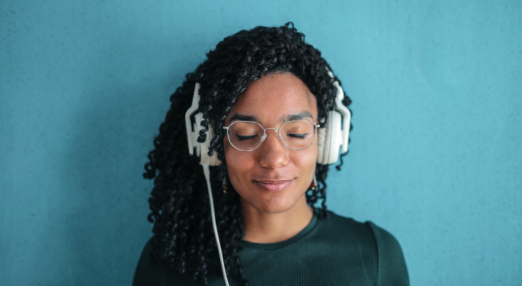 Smiling woman wearing headphones